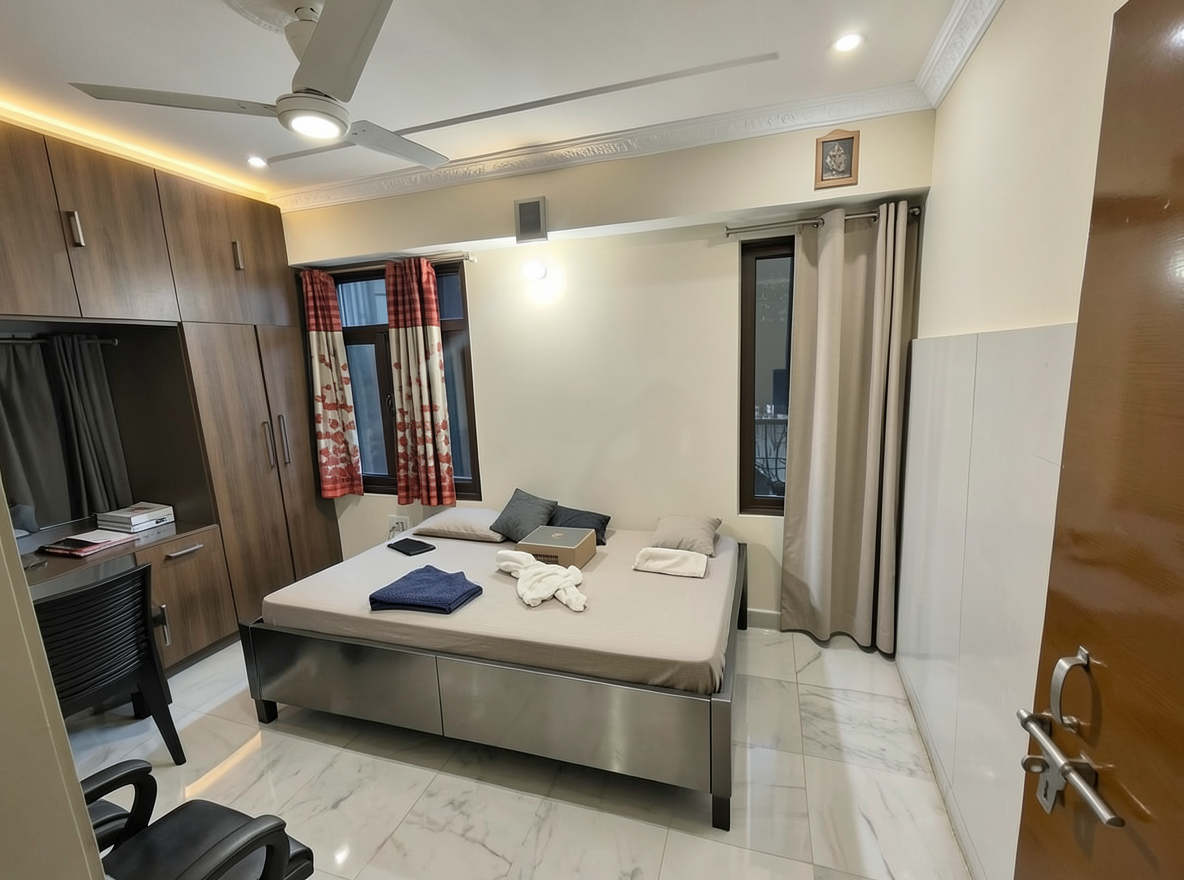 Main redesign studio: Redesign this room in a Modern interior style: clean lines, a neutral palette with bold accents, sleek low-profile furniture, glass and matte-metal su