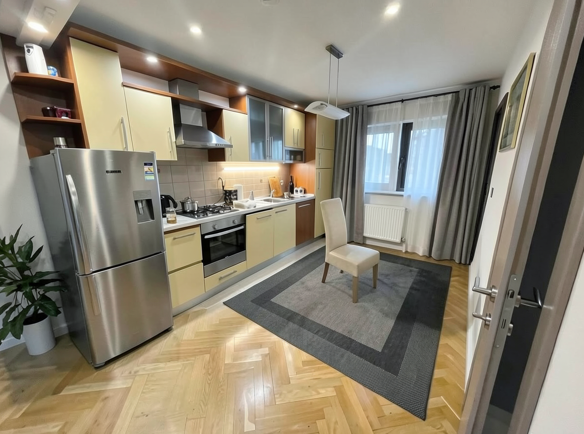 Main redesign studio: Redesign this room in a Modern interior style: clean lines, a neutral palette with bold accents, sleek low-profile furniture, glass and matte-metal su