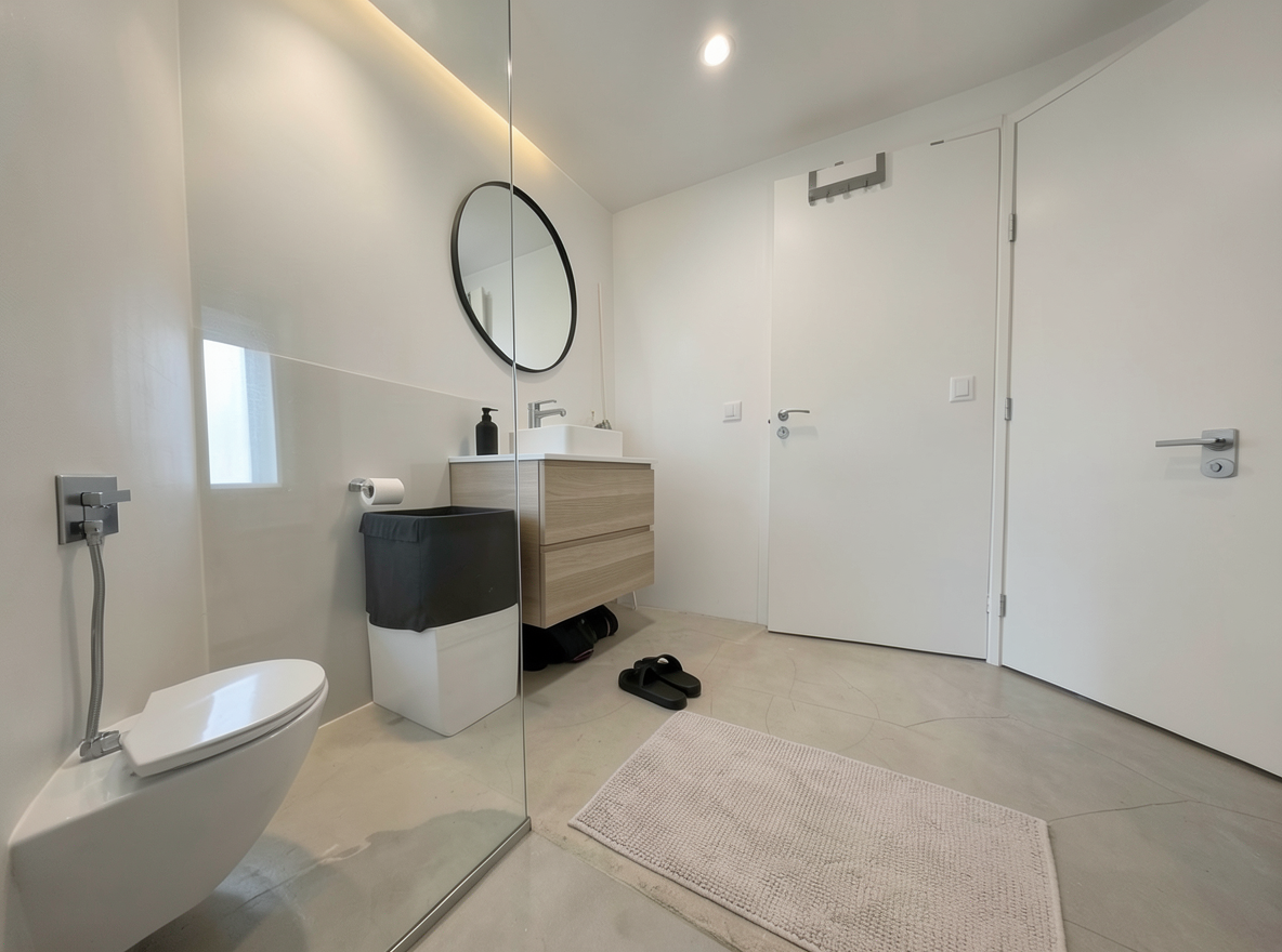 Main redesign studio: Redesign this room in a Modern interior style: clean lines, a neutral palette with bold accents, sleek low-profile furniture, glass and matte-metal su