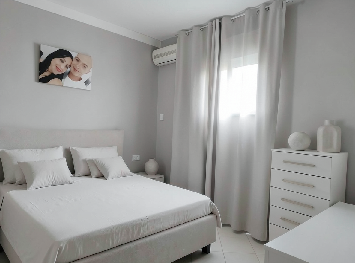 Main redesign studio: Redesign this room in a Minimalist interior style: an uncluttered space, a monochrome neutral palette, a few sculptural pieces, concealed storage, sof