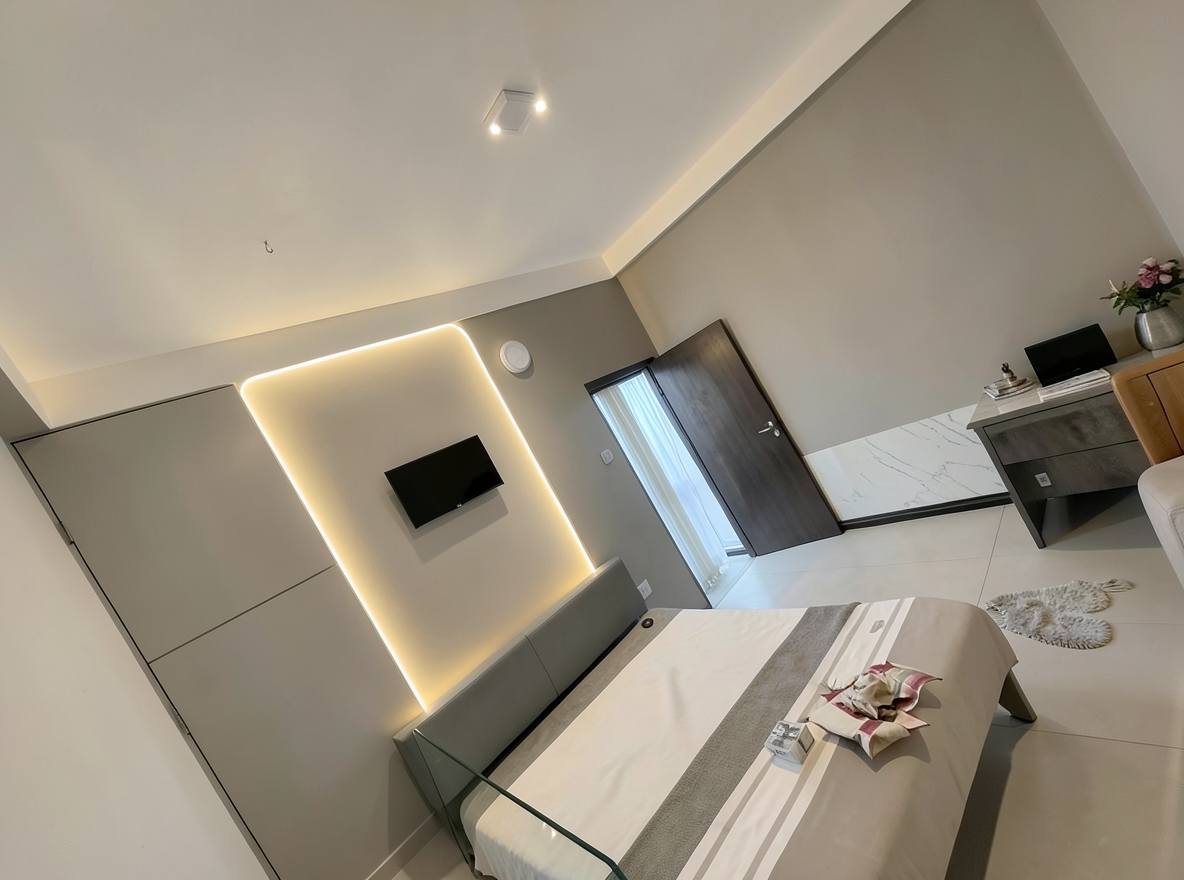 Main redesign studio: Redesign this room in a Modern interior style: clean lines, a neutral palette with bold accents, sleek low-profile furniture, glass and matte-metal su