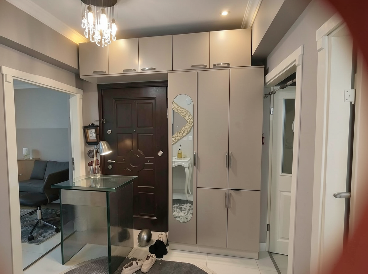 Main redesign studio: Redesign this room in a Modern interior style: clean lines, a neutral palette with bold accents, sleek low-profile furniture, glass and matte-metal su