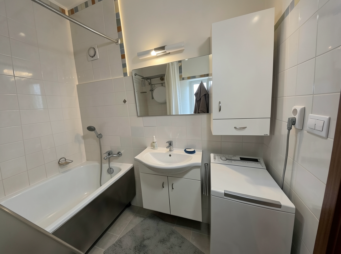 Main redesign studio: Redesign this room in a Modern interior style: clean lines, a neutral palette with bold accents, sleek low-profile furniture, glass and matte-metal su