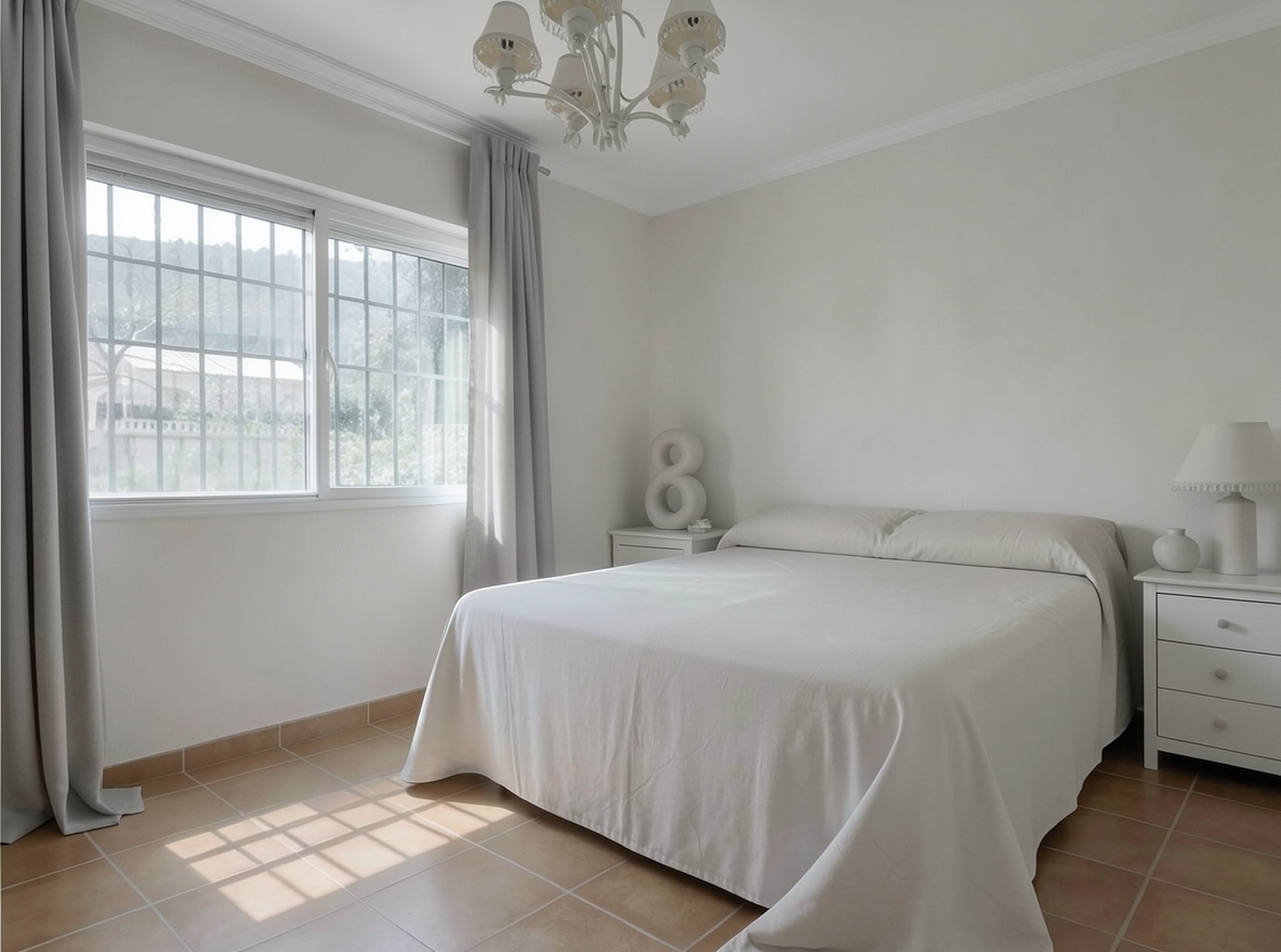 Main redesign studio: Redesign this room in a Minimalist interior style: an uncluttered space, a monochrome neutral palette, a few sculptural pieces, concealed storage, sof