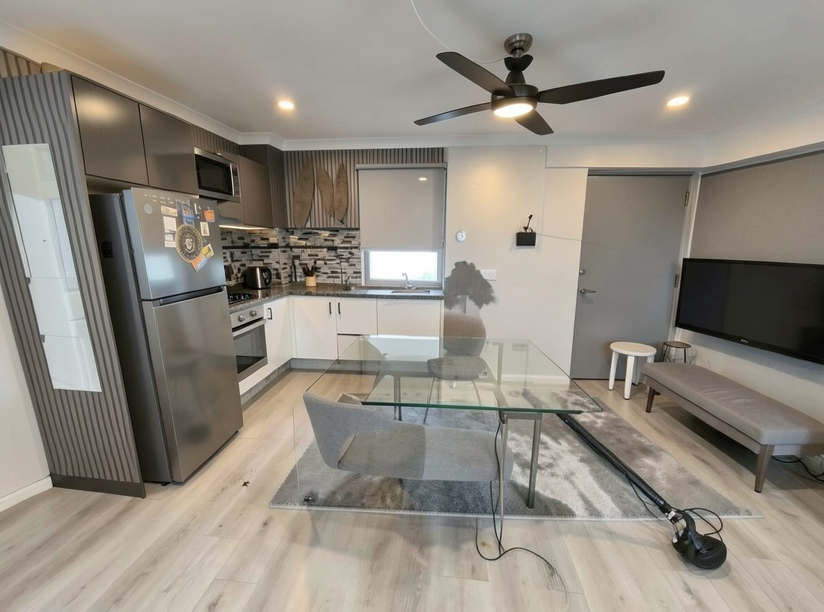 Main redesign studio: Redesign this room in a Modern interior style: clean lines, a neutral palette with bold accents, sleek low-profile furniture, glass and matte-metal su