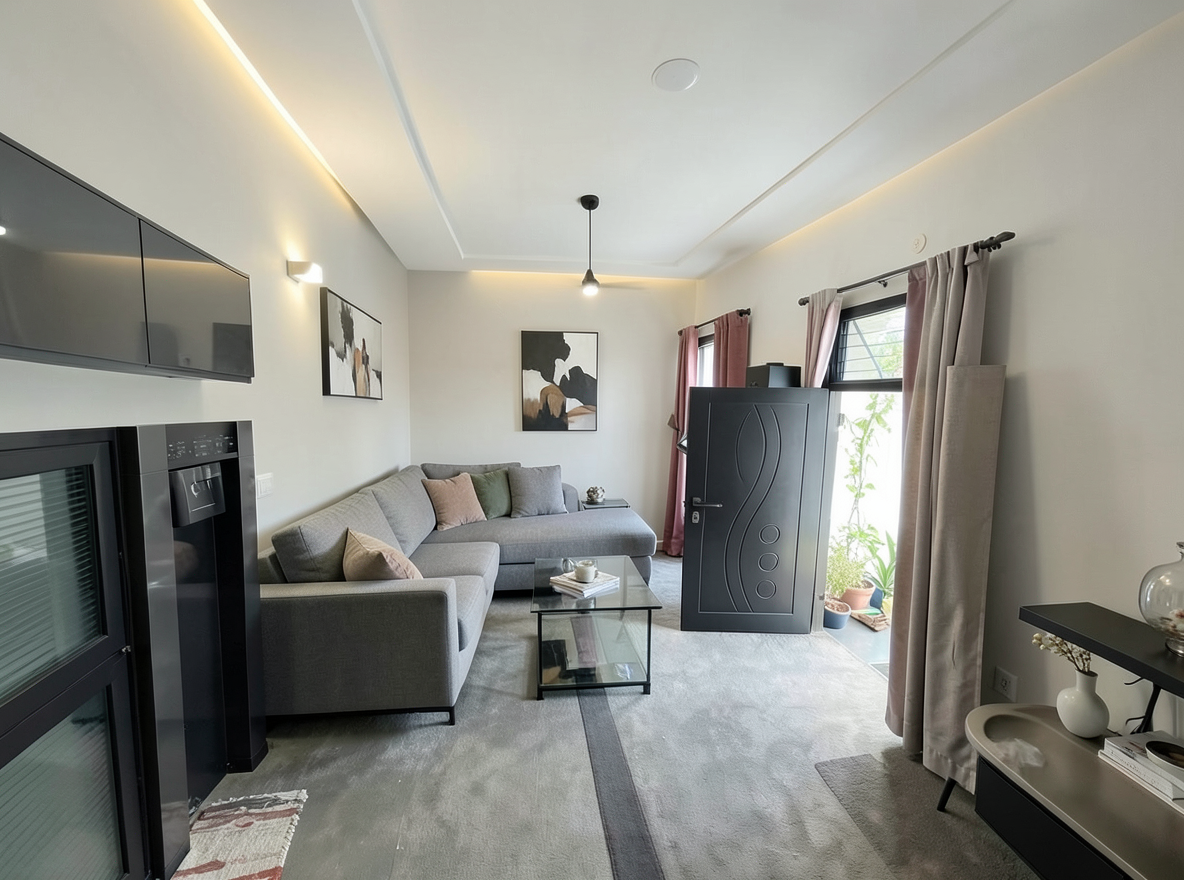 Main redesign studio: Redesign this room in a Modern interior style: clean lines, a neutral palette with bold accents, sleek low-profile furniture, glass and matte-metal su