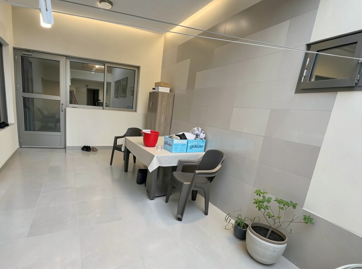 Main redesign studio: Redesign this room in a Modern interior style: clean lines, a neutral palette with bold accents, sleek low-profile furniture, glass and matte-metal su