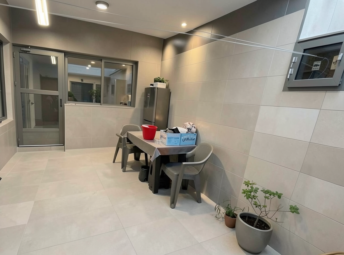 Main redesign studio: Redesign this room in a Modern interior style: clean lines, a neutral palette with bold accents, sleek low-profile furniture, glass and matte-metal su