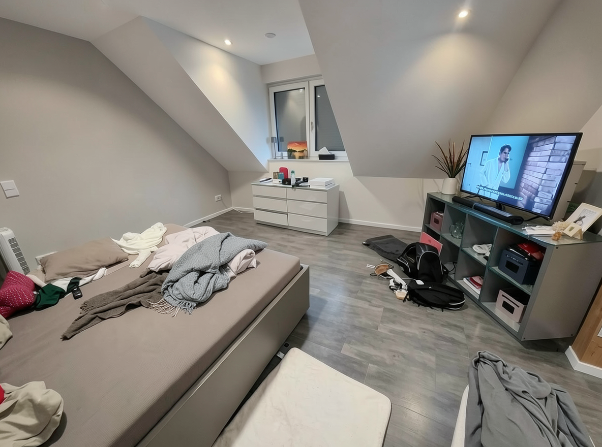 Main redesign studio: Redesign this room in a Modern interior style: clean lines, a neutral palette with bold accents, sleek low-profile furniture, glass and matte-metal su