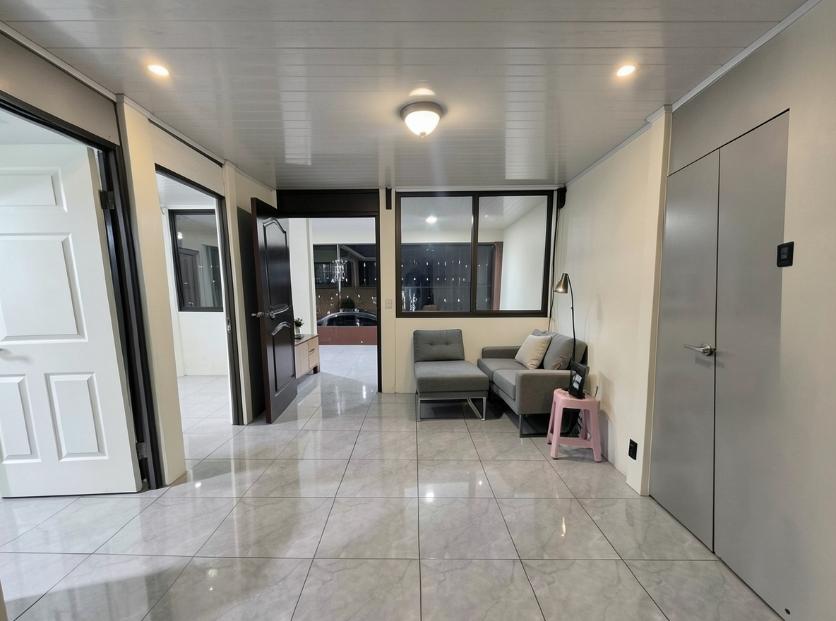 Main redesign studio: Redesign this room in a Modern interior style: clean lines, a neutral palette with bold accents, sleek low-profile furniture, glass and matte-metal su