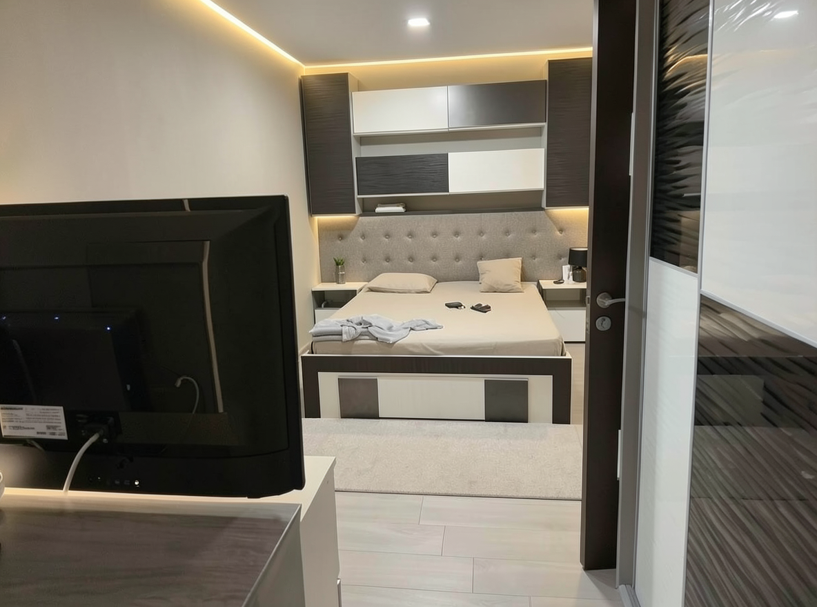 Main redesign studio: Redesign this room in a Modern interior style: clean lines, a neutral palette with bold accents, sleek low-profile furniture, glass and matte-metal su