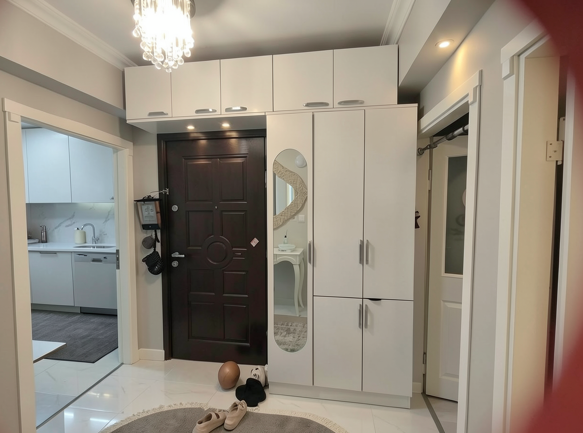 Main redesign studio: Redesign this room in a Modern interior style: clean lines, a neutral palette with bold accents, sleek low-profile furniture, glass and matte-metal su
