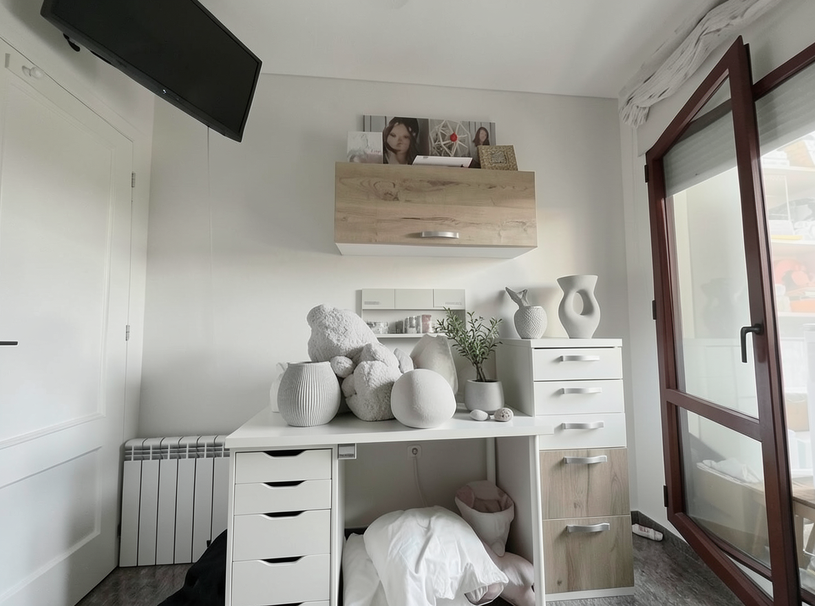 Main redesign studio: Redesign this room in a Minimalist interior style: an uncluttered space, a monochrome neutral palette, a few sculptural pieces, concealed storage, sof