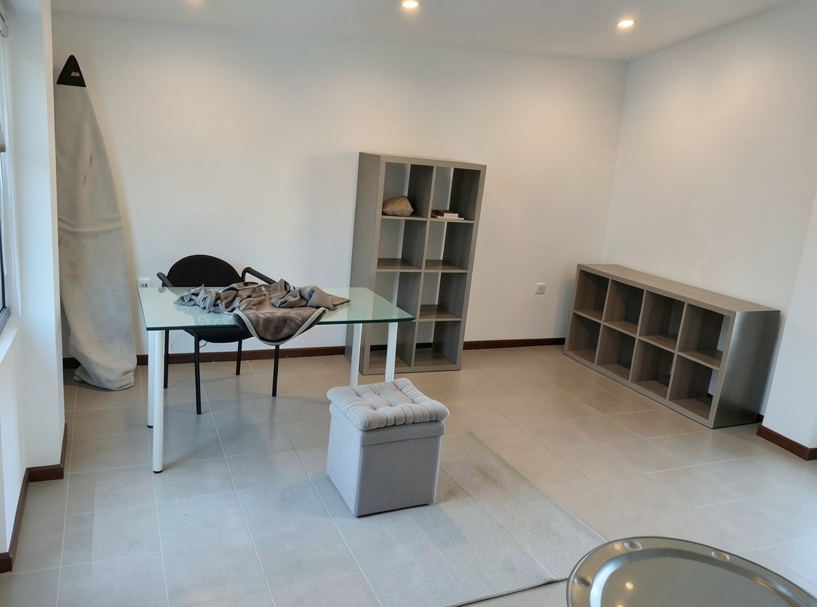 Main redesign studio: Redesign this room in a Modern interior style: clean lines, a neutral palette with bold accents, sleek low-profile furniture, glass and matte-metal su