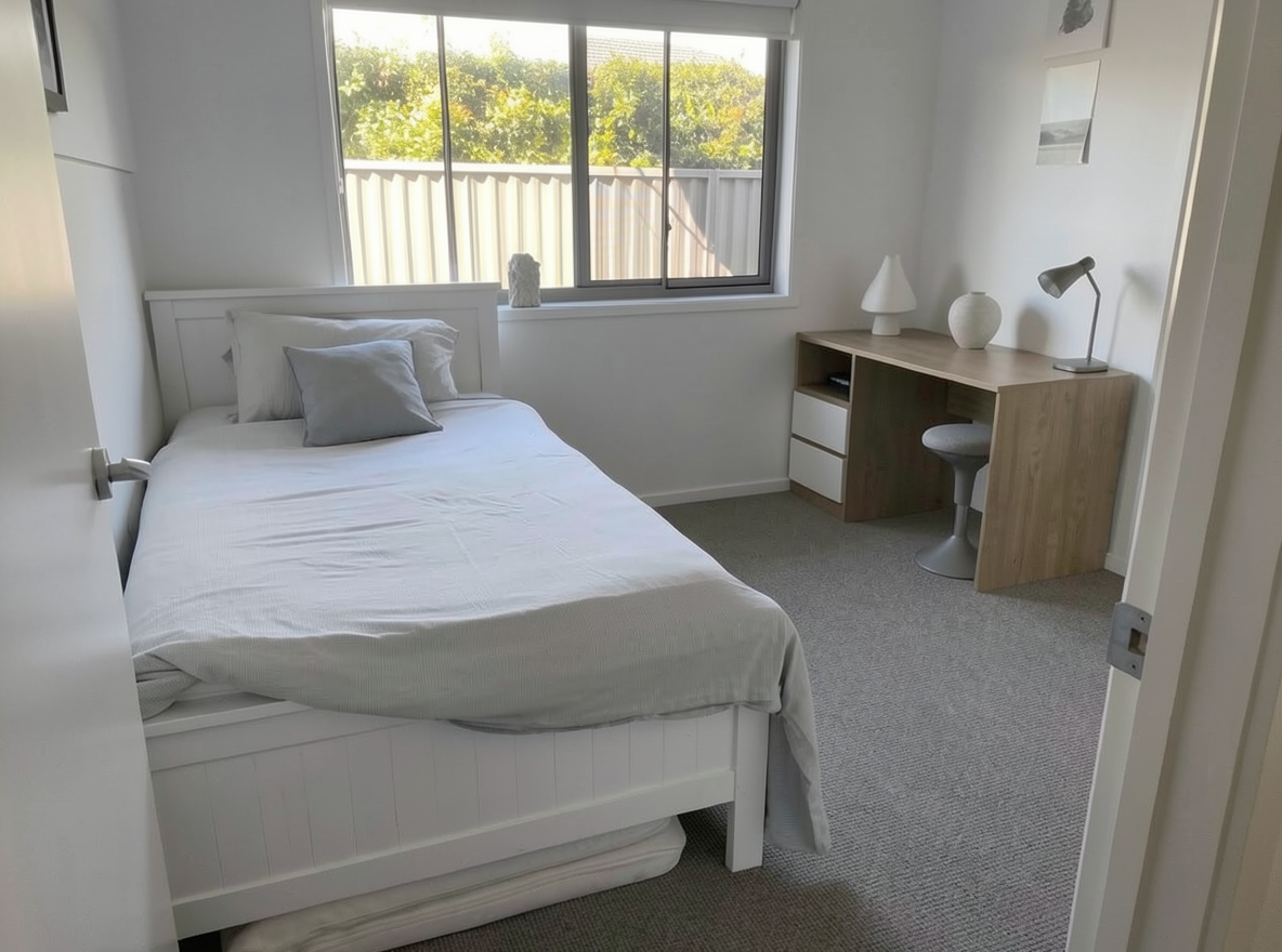 Main redesign studio: Redesign this room in a Minimalist interior style: an uncluttered space, a monochrome neutral palette, a few sculptural pieces, concealed storage, sof