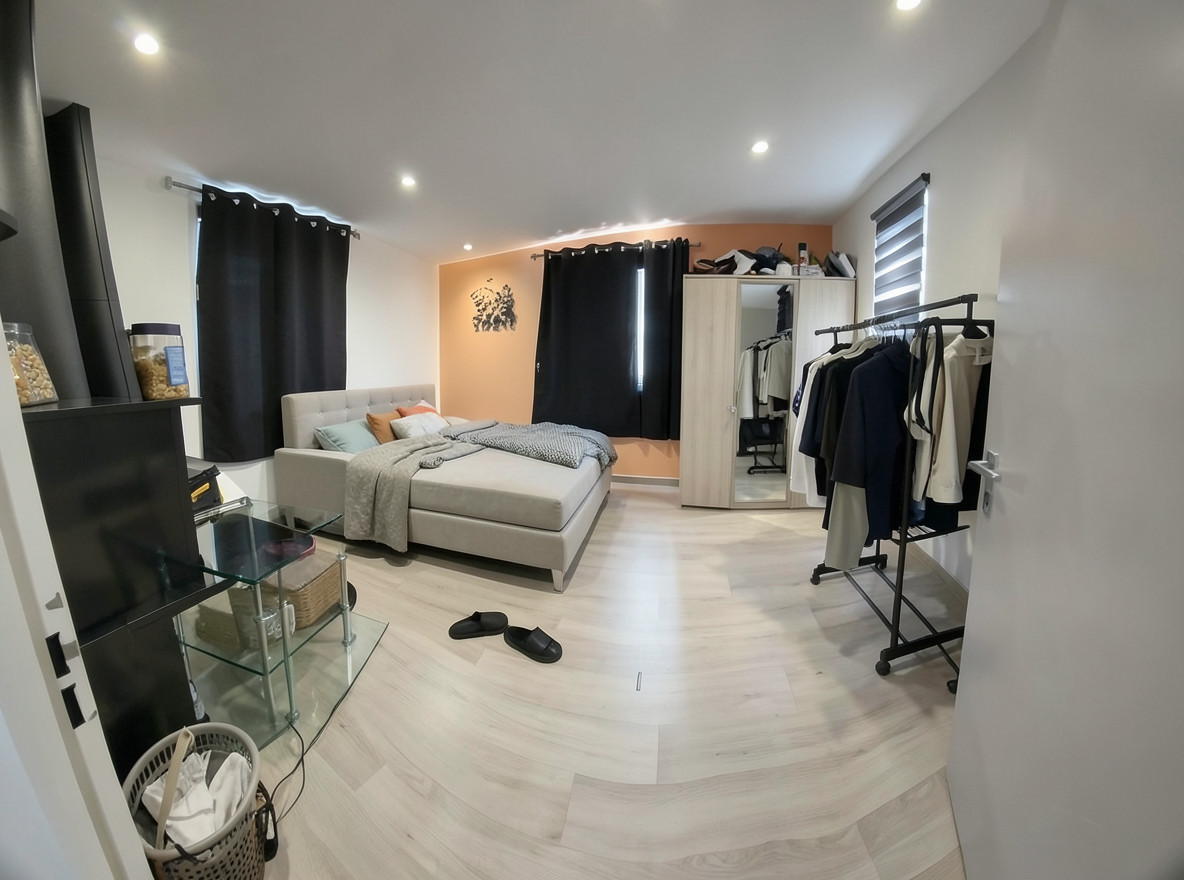 Main redesign studio: Redesign this room in a Modern interior style: clean lines, a neutral palette with bold accents, sleek low-profile furniture, glass and matte-metal su